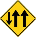 W6-5a Two-way traffic (3-Lane, one lane in the opposing direction)