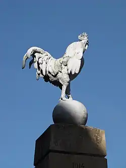Cockerel crowning the village's war monument