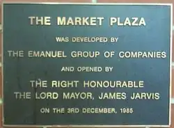 Plaque marking the opening of The Market Plaza by Lord Mayor James Jarvis on 3 December 1985.