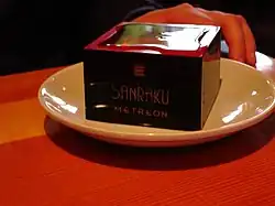 A decorated lacquer masu