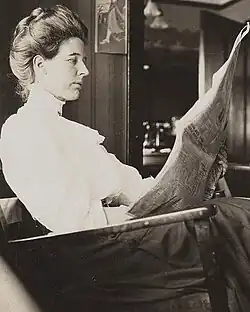 Shockley reading a newspaper