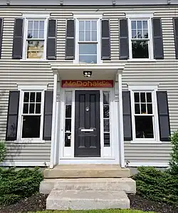 Facade of McDonald's located in Freeport where the restaurant was forced to maintain the pre-existing exterior of the house.