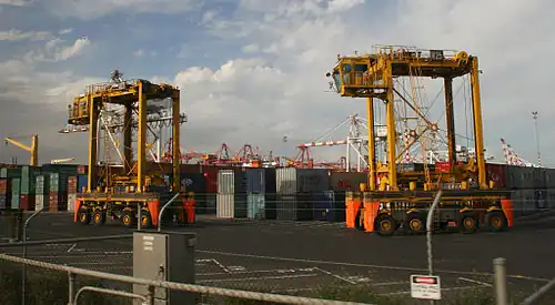 Straddle carriers in operation at the Port of Melbourne, Australia