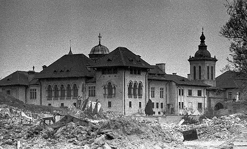 Mihai Vodă Monastery, Bucharest, founded in 1594, demolished in 1985-1986 while the church and the bell tower were moved 270 meters from their initial place to be saved, by engineer Eugeniu Iordăchescu behind 1980s apartment buildings, unknown architect[130]