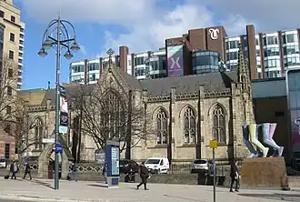 Mill Hill Chapel and the sculpture "Legs Walking"