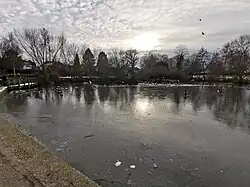 Pond partially frozen over following the "Beast from the East II" of February 2021