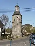 Tower of the former de la Torre castel (French: Château-ferme de la Torre), 16th century.