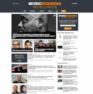 Screenshot of Music Business Worldwide webpage showing headlines on the left side, an internal ad for mailing list subscriber, a job listing section, and popular articles section on the right side