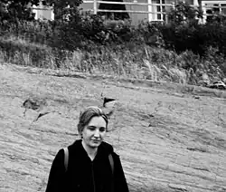 Gendron standing in a field