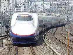 Set N11 of the E2 series Shinkansen at Tokyo on an Asama 514 service, similar to those used on Asahi services