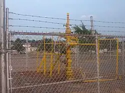 A natural gas well in front of the Frank Anthony Center in Springhill