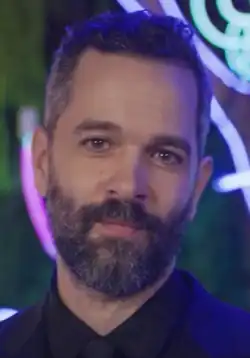 Neil Druckmann smirking