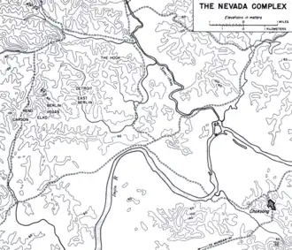 A black and white map depicting UN outposts which are located in a line centrally on the left of the map, including Carson, Reno, Elko, Vegas, Berlin, East Berlin and Detroit and the Hook, which is depicted to their right in the middle of the map. Numerous contour lines detail the terrain of the area, while roads are depicted running both horizontally and vertically. To the south, the Imjin River runs from east to west, turning south, before hooking north and then again to the south, while the Samichon River runs from the north to the west on the right of the map before meeting the Imjin River at their confluence. To the bottom right is the town of Choksong, which is depicted to the south of the river.