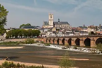 The city seen from the left bank of the Loire with Nevers Cathedral in the background