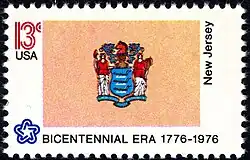 The New Jersey state flag as depicted in the 1976 bicentennial postage stamp series.