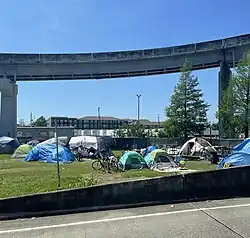 A homeless camp under a highway bridge in New Orleans, LA