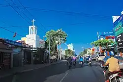 Martin de Tours Parish Church on Nguyễn Thị Minh Khai Street looking towards Thị Nghè Bridge and surrounding buildings