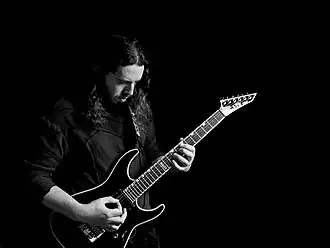 Nimblkorg playing guitar 2023