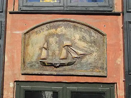 Ship relief below one of the windows