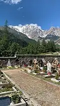 Old Church cemetery with the east wall of Monte Rosa in the background, Macugnaga, Italy