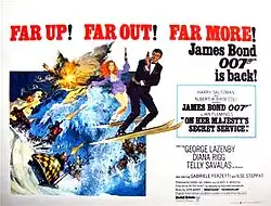 A man in a dinner jacket on skis, holding a gun. Next to him is a red-headed woman, also on skis and with a gun. They are being pursued by men on skis and a bobsleigh, all with guns. In the top left of the picture are the words FAR UP! FAR OUT! FAR MORE! James Bond 007 is back!