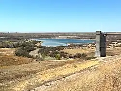 The lake as viewed from the dam w/intake tower at right, 4-2024