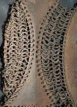 Ottoman riveted mail, alternating rows of round riveted links and solid links, 16th century.