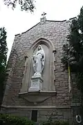 Statue of Our Lady of North Carolina at the front of the school.