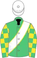 Emerald green, white sash with yellow piping, emerald green and yellow check sleeves, white cap with pompon