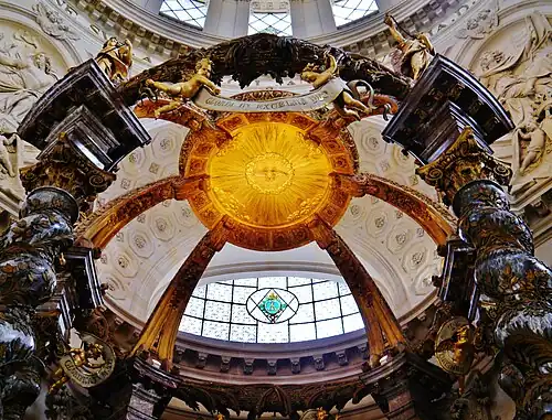 The upper portion of the baldachin