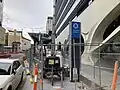 New Grattan street western station entrance, looking east towards Royal Parade, January 2024