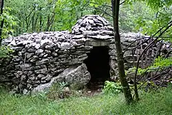Stone hut in a forest