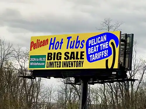 Billboard for Pelican Hot Tubs, with the slogan "Pelican beat the tariffs"