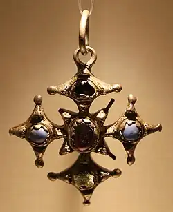 Silver cross pendant with glass and garnets, c. 1500. Found near Callan, County Kilkenny