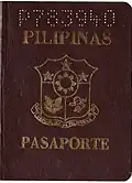 Brown passport issued before May 1, 1995.