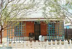 The M.J. Sharp House was built in 1890 and is located at 1012 S. 1st Avenue. It was listed in the National Register of historic Places on January 12, 1995, reference: #94001535.