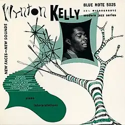 An abstract design in green and black, with a photo of Kelly on the right. The title and artist's name are at the top, alongside an abstract tree illustration. The Blue Note logo is in the upper right corner, labeled as part of the "modern jazz series."