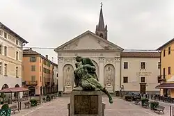 Piazza Sant'Agostino, old town. War memorial and Sant'Agostino church in the background