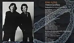 A monochrome photograph of two middle-aged men, alongside which is a list of credits