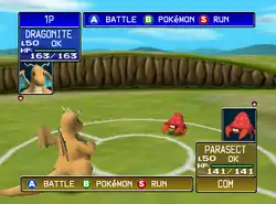 A horizontal rectangular video game screenshot that is a digital representation of a grassy battle field. An orange dragon and red crab-like insect with a large mushroom on its back face each other near the center. In the top left corner is a box that reads "1P Dragonite" and includes statistics for the dragon. In the bottom right corner is a similar box that reads "Parasect Com" with statistics for the insect.