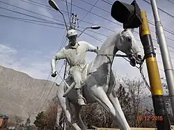This statue is made to show the spirit of the Polo Sport. It is located at Jutial. Polo is played every year in the valley Shandoor.