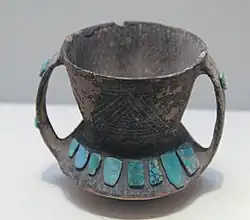 Pottery jar inlaid with turquoise, Siba Culture, Gansu.