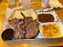 Pulled pork, brisket, baked beans and mac & cheese from Martin's BBQ in Nashville, TN