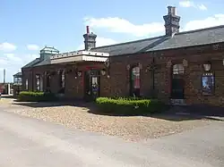 Long low red brick building