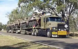 RACT Mack truck as a triple road-train carrying 6 ASLAVs