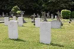 Foreground: some of the Commonwealth War Graves Commission maintained headstones & graves