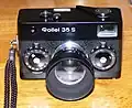 Black Rollei&nbsp;35&nbsp;S with metal lens hood and UV filter