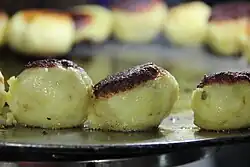 Patties being prepared by street vendor in Powai