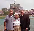 Coughlin with his mother Louise Coughlin and Rahm Emanuel, Wrigley Field, 2003