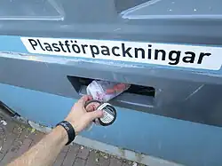 Wrapping up the plogging session at the local recycling station, Gothenburg (Sweden) on July 11, 2019. Here recycling plastic containers.